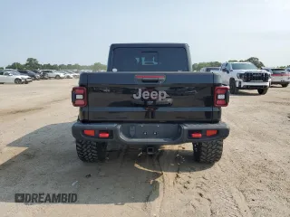 2020 Jeep Gladiator Rubicon with VIN 1C6JJTBG2LL166964, listed as a Copart auction lot 58041945 with 62,716 mi miles and Salvage title. Bid and sale history available at DreamBid. Image 6.
