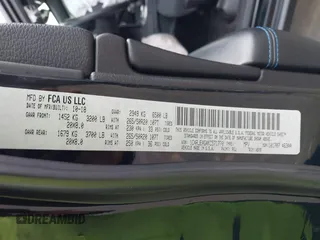 2019 Jeep Grand Cherokee Laredo E with VIN 1C4RJEAGXKC571770, listed as a IAAI auction lot 41677487 with 113,089 mi miles. Bid and sale history available at carsss.com. Image 9.