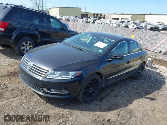 2013 Volkswagen CC Sport with VIN WVWBN7AN6DE509497, listed as a IAAI auction lot 41854748 with 208,227 mi miles and . Bid and sale history available at DreamBid. Image 2.