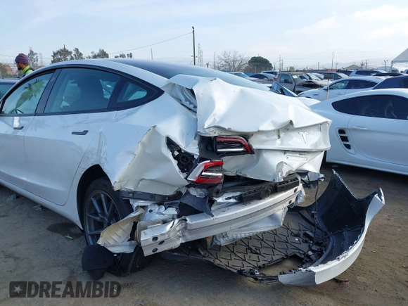 2022 Tesla Model 3 with VIN 5YJ3E1EA1NF167711, listed as a IAAI auction lot 41594266 with 50,554 mi miles and . Bid and sale history available at DreamBid. Image 6.
