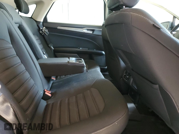 2018 Ford Fusion SE z VIN 3FA6P0HDXJR130677, wystawiony jako Copart lot #51737345 z przebiegiem 129 918 mil mil oraz Szkoda całkowita • Salvage title. Historia ofert i sprzedaży dostępna na DreamBid. Obrazek 11.