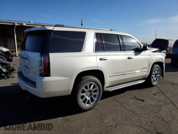 2015 GMC Yukon Denali with VIN 1GKS2CKJ7FR183710, listed as a Copart auction lot 49074135 with 230,526 mi miles and Salvage Title. Bid and sale history available at carsss.com. Image 3.