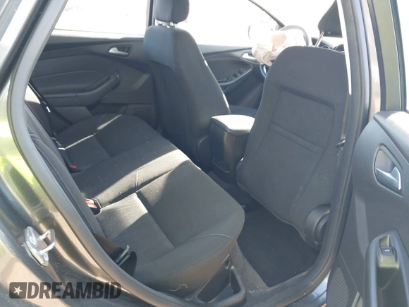 2018 Ford Focus SE z VIN 1FADP3F2XJL316101, wystawiony jako IAAI lot #40805650 z przebiegiem 53 551 mil mil oraz . Historia ofert i sprzedaży dostępna na DreamBid. Obrazek 8.
