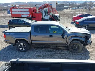 2018 Toyota Tacoma SR with VIN 5TFCZ5AN9JX123749, listed as a IAAI auction lot 41768884 with 42,852 mi miles and . Bid and sale history available at DreamBid. Image 13.