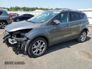 2014 Ford Escape Titanium с VIN 1FMCU0J96EUD41199, выставлен на аукционе Copart как лот 59380245 с пробегом 100 319 миль миль и Списание • Salvage title. История ставок и продаж доступна на DreamBid. Изображение 1.