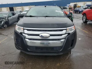 2014 Ford Edge SE z VIN 2FMDK4GC8EBA85769, wystawiony jako Copart lot #57787725 z przebiegiem 173 183 mil mil oraz Czysty tytuł • Clean title. Historia ofert i sprzedaży dostępna na DreamBid. Obrazek 5.