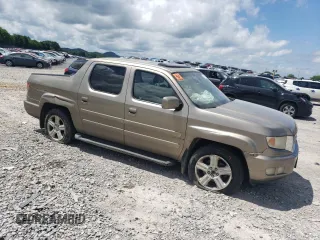 2011 Honda Ridgeline RTL with VIN 5FPYK1F59BB007045, listed as a Copart auction lot 61263715 with 159,527 mi miles and Clean title. Bid and sale history available at DreamBid. Image 4.