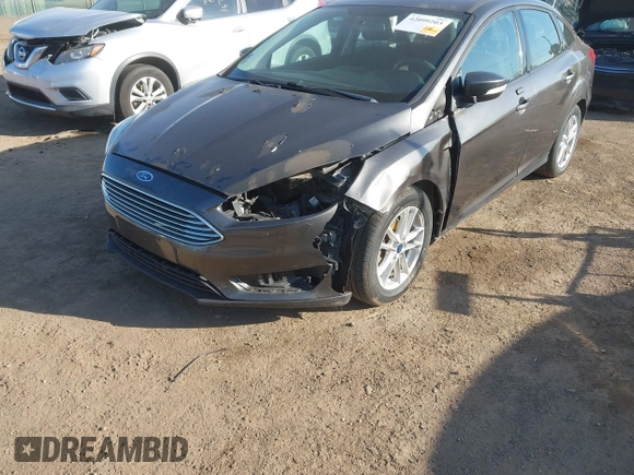 2016 Ford Focus SE with VIN 1FADP3F2XGL207906, listed as a IAAI auction lot 42099203 with 95,527 mi miles. Bid and sale history available at carsss.com. Image 6.