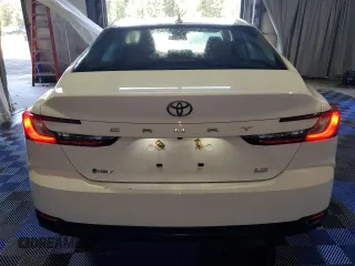 2025 Toyota Camry LE with VIN 4T1DAACKXSU501647, listed as a Copart auction lot 54232915 with 21,997 mi miles and Clean Title. Bid and sale history available at carsss.com. Image 6.