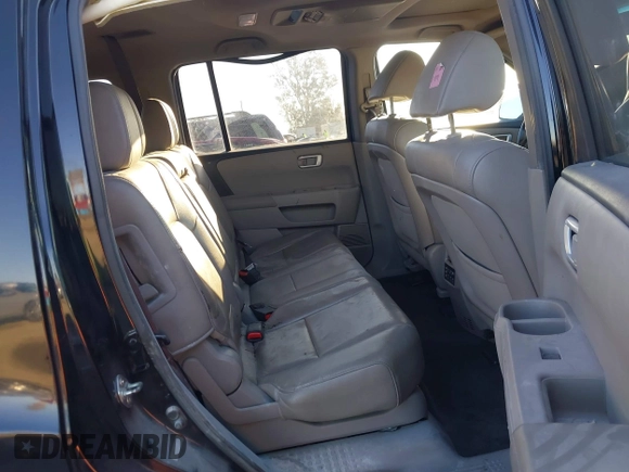 2012 Honda Pilot EX-L with VIN 5FNYF3H60CB035624, listed as a IAAI auction lot 41321568 with 309,545 mi miles and . Bid and sale history available at DreamBid. Image 8.