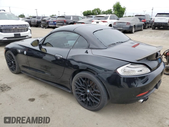 2012 BMW Z4 sDrive28i with VIN WBALL5C56CE716558, listed as a Copart auction lot 62003125 with 93,438 mi miles and Salvage title. Bid and sale history available at DreamBid. Image 2.