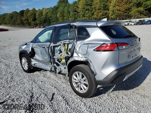 2023 Toyota Corolla Cross LE z VIN 7MUBAABG0PV074344, wystawiony jako Copart lot #70101104 z przebiegiem 9 577 mil mil oraz Szkoda całkowita • Salvage title. Historia ofert i sprzedaży dostępna na DreamBid. Obrazek 2.