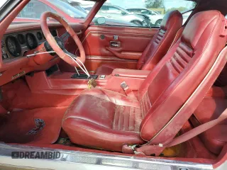 1978 Pontiac Firebird z VIN 2U87K8L123850, wystawiony jako Copart lot #79076374 z przebiegiem 64 829 mil mil oraz Szkody całkowita. Historia ofert i sprzedaży dostępna na DreamBid. Obrazek 7.