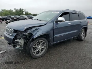 2019 Jeep Grand Cherokee High Altitude with VIN 1C4RJFCG8KC671885, listed as a Copart auction lot 66533944 with 95,513 mi miles and Salvage Title. Bid and sale history available at carsss.com. Image 1.