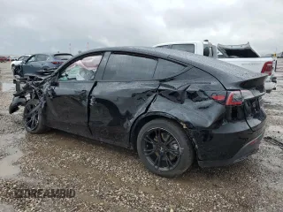2024 Tesla Model Y z VIN 7SAYGDED7RF018059, wystawiony jako Copart lot #54273785 z przebiegiem 30 080 mil mil oraz Szkoda całkowita • Salvage title. Historia ofert i sprzedaży dostępna na DreamBid. Obrazek 2.