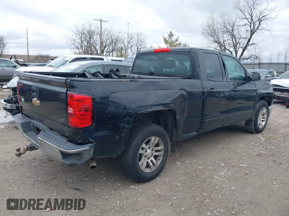 2015 Chevrolet Silverado 1500 LT with VIN 1GCRCREH4FZ200417, listed as a IAAI auction lot 41732194 with 135,000 mi miles. Bid and sale history available at carsss.com. Image 4.