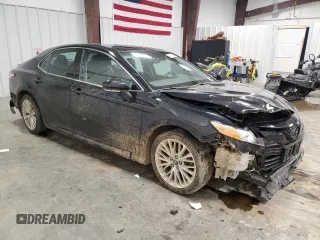 2019 Toyota Camry LE with VIN 4T1B11HK5KU169553, listed as a Copart auction lot 48195595 with 74,429 mi miles and Salvage Title. Bid and sale history available at carsss.com. Image 4.