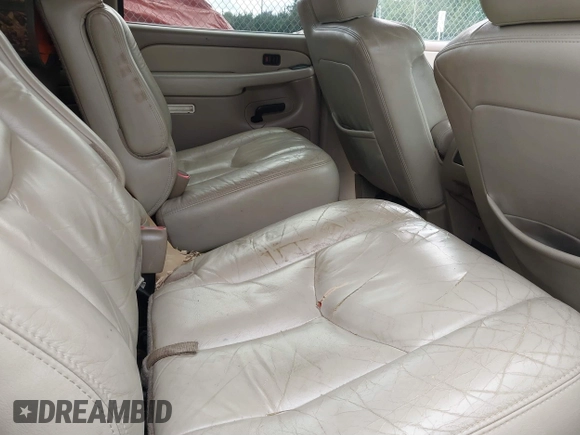 2003 Chevrolet Suburban LT z VIN 3GNFK16Z23G280270, wystawiony jako IAAI lot #41627119 z przebiegiem 246 282 mil mil oraz . Historia ofert i sprzedaży dostępna na DreamBid. Obrazek 8.