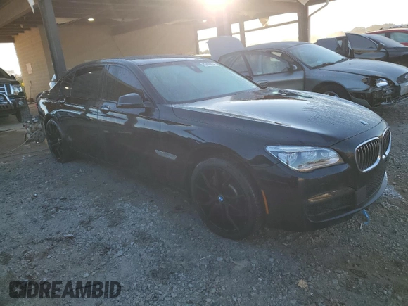 2015 BMW 7 Series 750Li with VIN WBAYE8C55FD781557, listed as a Copart auction lot 83984014 with 138,772 mi miles and Salvage Title. Bid and sale history available at carsss.com. Image 4.