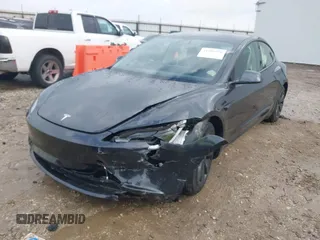 2025 Tesla Model 3 Long Range with VIN 5YJ3E1EA5SF911256, listed as a IAAI auction lot 41509976 with 1,806 mi miles. Bid and sale history available at carsss.com. Image 6.