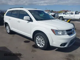 2015 Dodge Journey SXT with VIN 3C4PDCBG7FT530024, listed as a IAAI auction lot 42076807 with 159,675 mi miles. Bid and sale history available at carsss.com. Image 1.