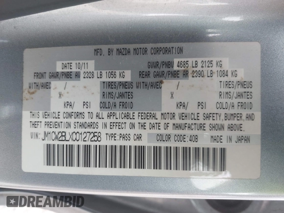 2012 Mazda 5 Sport with VIN JM1CW2BLXC0127258, listed as a IAAI auction lot 42226885 with 112,102 mi miles and . Bid and sale history available at DreamBid. Image 9.