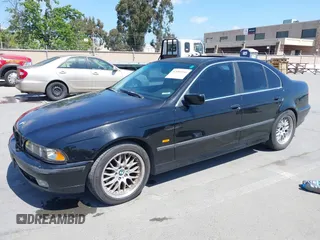 1997 BMW 5 Series 540iA with VIN WBADE6325VBW55346, listed as a IAAI auction lot 42085046 with 216,212 mi miles. Bid and sale history available at carsss.com. Image 2.