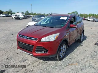 2016 Ford Escape Titanium with VIN 1FMCU9JX9GUA16892, listed as a IAAI auction lot 42110986 with 87,775 mi miles and . Bid and sale history available at DreamBid. Image 2.