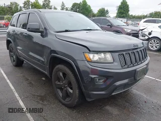 2015 Jeep Grand Cherokee Altitude z VIN 1C4RJFAG3FC854345, wystawiony jako IAAI lot #42400181 z przebiegiem 61 806 mil mil oraz . Historia ofert i sprzedaży dostępna na DreamBid. Obrazek 1.