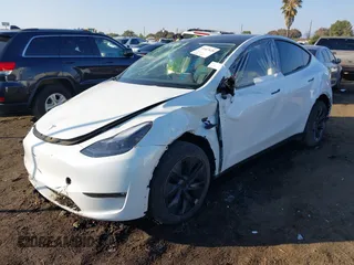 2024 Tesla Model Y Long Range with VIN 7SAYGDEE0RF209847, listed as a IAAI auction lot 41447620 with 7,646 mi miles and . Bid and sale history available at DreamBid. Image 2.