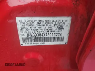 2007 Honda Fit with VIN JHMGD384X7S013234, listed as a Copart auction lot 57022645 with 222,146 mi miles and Salvage title. Bid and sale history available at DreamBid. Image 12.