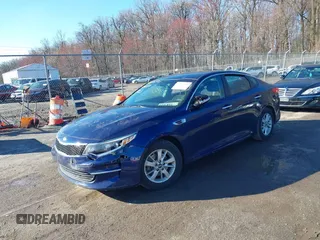 2018 Kia Optima LX with VIN 5XXGT4L33JG191559, listed as a IAAI auction lot 41875793 with 152,479 mi miles. Bid and sale history available at carsss.com. Image 2.