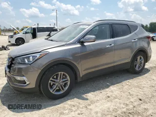 2018 Hyundai Santa Fe 2.4L with VIN 5XYZU3LB9JG563893, listed as a Copart auction lot 62058745 with 141,353 mi miles and Salvage title. Bid and sale history available at DreamBid. Image 1.