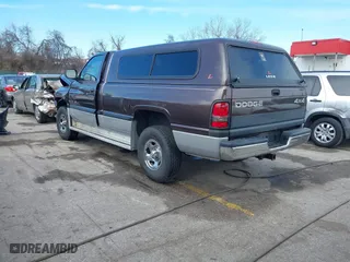 1998 Dodge Ram 1500 with VIN 3B7HF16Z9WM220840, listed as a IAAI auction lot 41595328 with 199,281 mi miles. Bid and sale history available at carsss.com. Image 3.