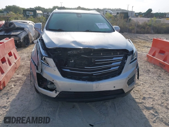 2017 Cadillac XT5 Luxury FWD with VIN 1GYKNBRS8HZ205769, listed as a IAAI auction lot 41865624 with 112,767 mi miles. Bid and sale history available at carsss.com. Image 6.