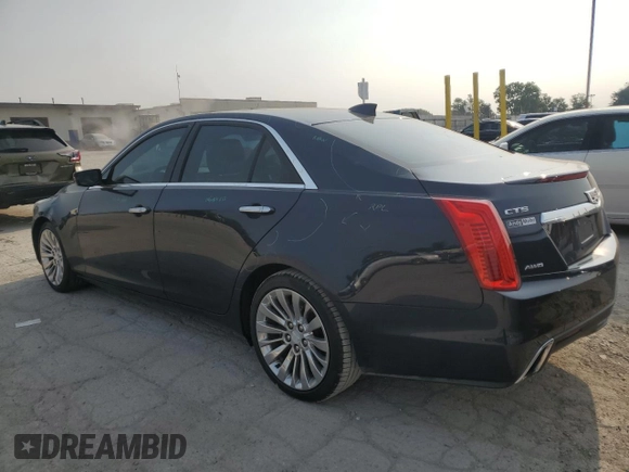 2017 Cadillac CTS Luxury AWD with VIN 1G6AX5SX7H0141380, listed as a Copart auction lot 58999135 with 91,003 mi miles and Salvage title. Bid and sale history available at DreamBid. Image 2.