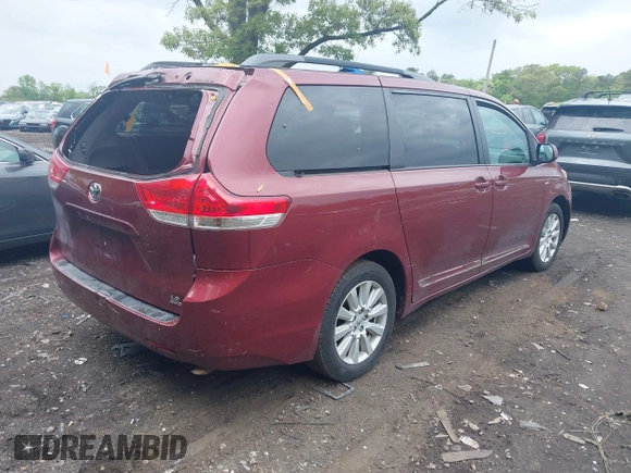 2017 Toyota Sienna LE with VIN 5TDJZ3DC9HS164792, listed as a IAAI auction lot 42263886 with 186,018 mi miles and . Bid and sale history available at DreamBid. Image 4.