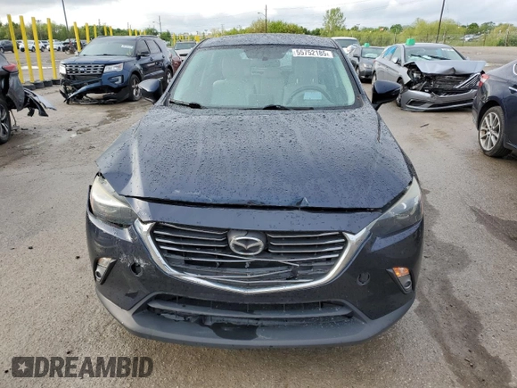 2017 Mazda CX-3 Grand Touring z VIN JM1DKFD75H0141048, wystawiony jako Copart lot #55752185 z przebiegiem 89 960 mil mil oraz Szkody całkowita. Historia ofert i sprzedaży dostępna na DreamBid. Obrazek 5.