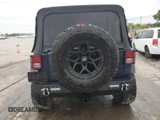 2013 Jeep Wrangler Unlimited Sport с VIN 1C4BJWDGXDL521666, выставлен на аукционе Copart как лот 57277255 с пробегом 158 793 миль миль и Списание • Salvage title. История ставок и продаж доступна на DreamBid. Изображение 6.