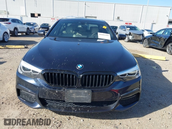 2018 BMW 5 Series 530i with VIN WBAJA5C59JWA38170, listed as a IAAI auction lot 41682219 with 61,990 mi miles and . Bid and sale history available at DreamBid. Image 12.
