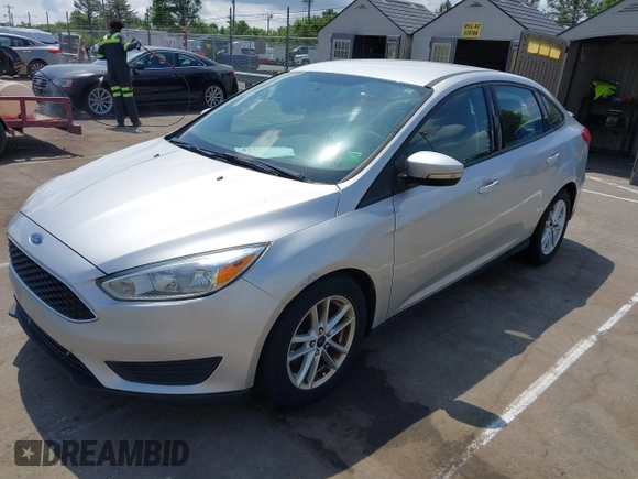 2016 Ford Focus SE with VIN 1FADP3F24GL244241, listed as a IAAI auction lot 42157073 with 85,739 mi miles. Bid and sale history available at carsss.com. Image 2.