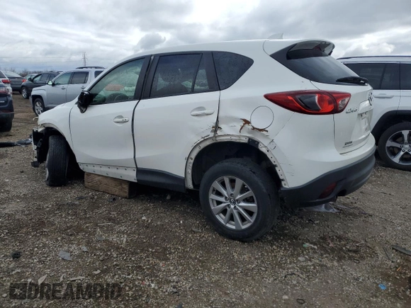 2015 Mazda CX-5 Touring with VIN JM3KE2CY2F0541400, listed as a Copart auction lot 52971015 with 131,569 mi miles and Clean Title. Bid and sale history available at carsss.com. Image 2.