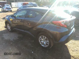 2019 Toyota C-HR XLE with VIN JTNKHMBX3K1034591, listed as a IAAI auction lot 40971538 with 135,200 mi miles. Bid and sale history available at carsss.com. Image 3.