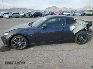 2017 Toyota 86 with VIN JF1ZNAA13H8706937, listed as a Copart auction lot 79115824 with 12,960 mi miles and Salvage Title. Bid and sale history available at carsss.com. Image 1.