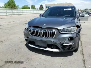 2016 BMW X1 xDrive28i z VIN WBXHT3C34GP883767, wystawiony jako Copart lot #56708375 z przebiegiem 96 285 mil mil oraz Szkoda całkowita • Salvage title. Historia ofert i sprzedaży dostępna na DreamBid. Obrazek 14.