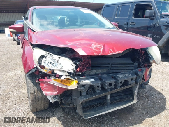 2013 Ford Focus SE z VIN 1FADP3F26DL242146, wystawiony jako IAAI lot #42679877 z przebiegiem 207 908 mil mil oraz . Historia ofert i sprzedaży dostępna na DreamBid. Obrazek 6.