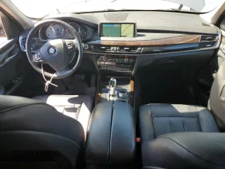 2014 BMW X5 xDrive35i z VIN 5UXKR0C50E0H23037, wystawiony jako Copart lot #56145725 z przebiegiem 82 955 mil mil oraz Szkody całkowita. Historia ofert i sprzedaży dostępna na DreamBid. Obrazek 8.