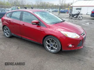 2014 Ford Focus SE with VIN 1FADP3K26EL412058, listed as a IAAI auction lot 42073435 with 119,568 mi miles. Bid and sale history available at carsss.com. Image 1.