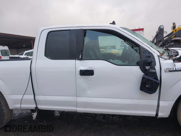 2020 Ford F-150 XL with VIN 1FTEX1C40LKE45241, listed as a IAAI auction lot 41403576 with 58,476 mi miles and . Bid and sale history available at DreamBid. Image 14.