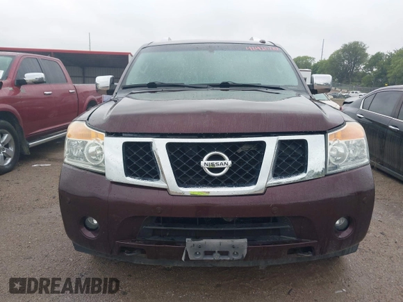 2014 Nissan Armada SL z VIN 5N1BA0NC8EN601509, wystawiony jako IAAI lot #42420782 z przebiegiem 131 717 mil mil oraz . Historia ofert i sprzedaży dostępna na DreamBid. Obrazek 12.